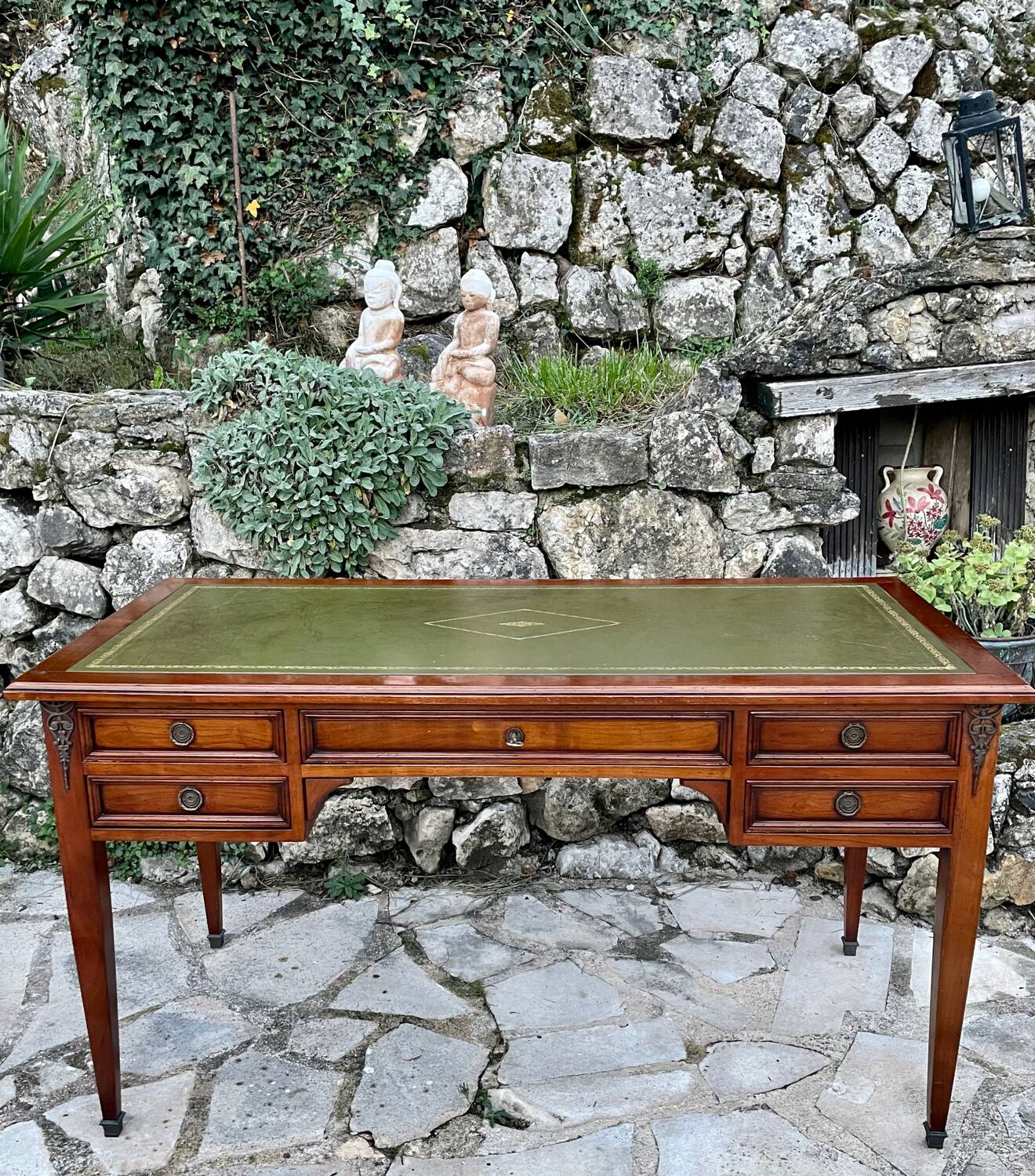 Elegant Louis XVI style mahogany flat desk from the 20th century