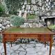 Elegant Louis XVI style mahogany flat desk from the 20th century