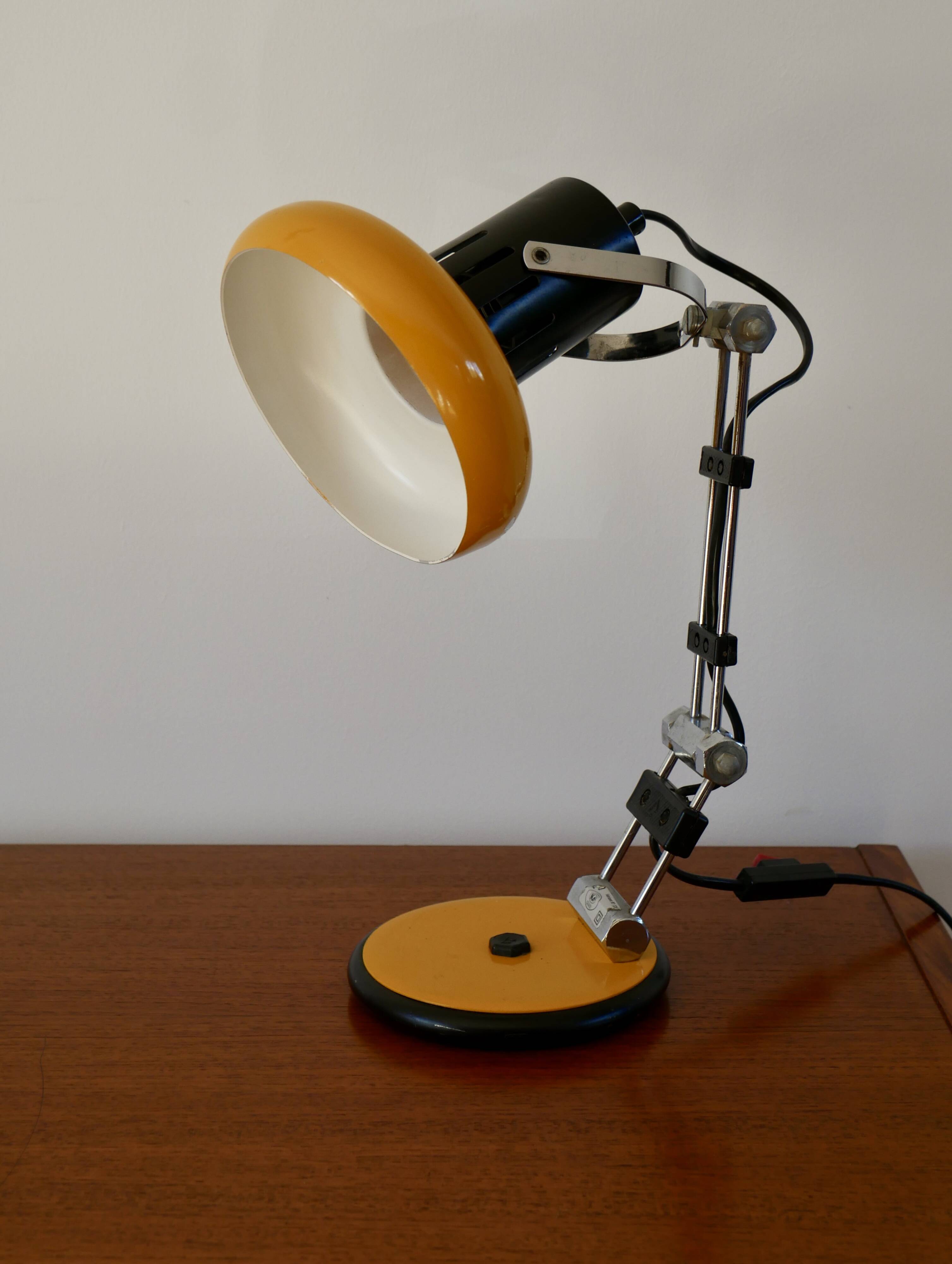 Articulated orange Aluminor desk lamp industrial design 70s