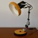 Articulated orange Aluminor desk lamp industrial design 70s