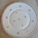 A lot of old white and gold porcelain plates T de F.