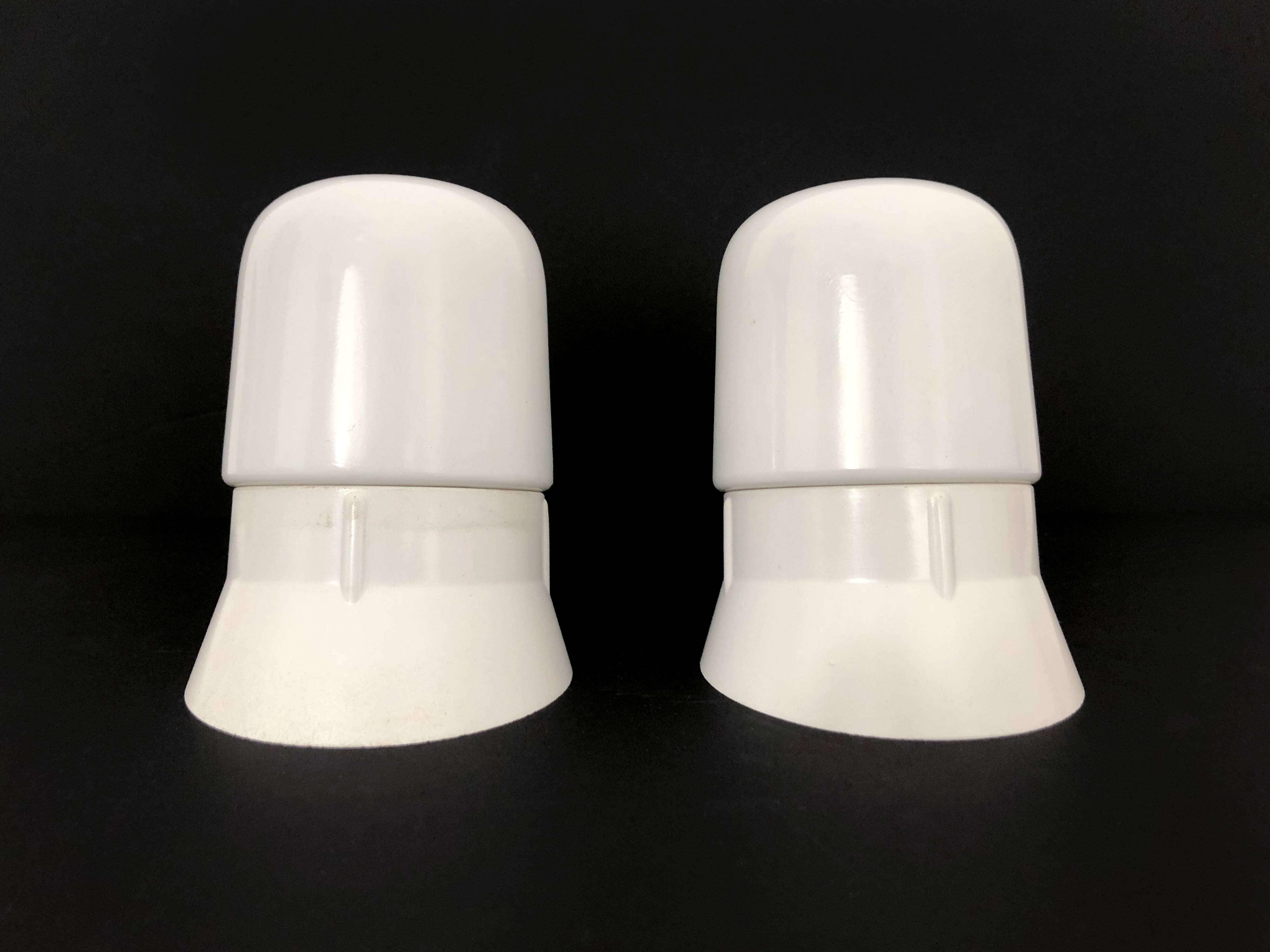 Pair of white oblique wall lights by Arno. 60s