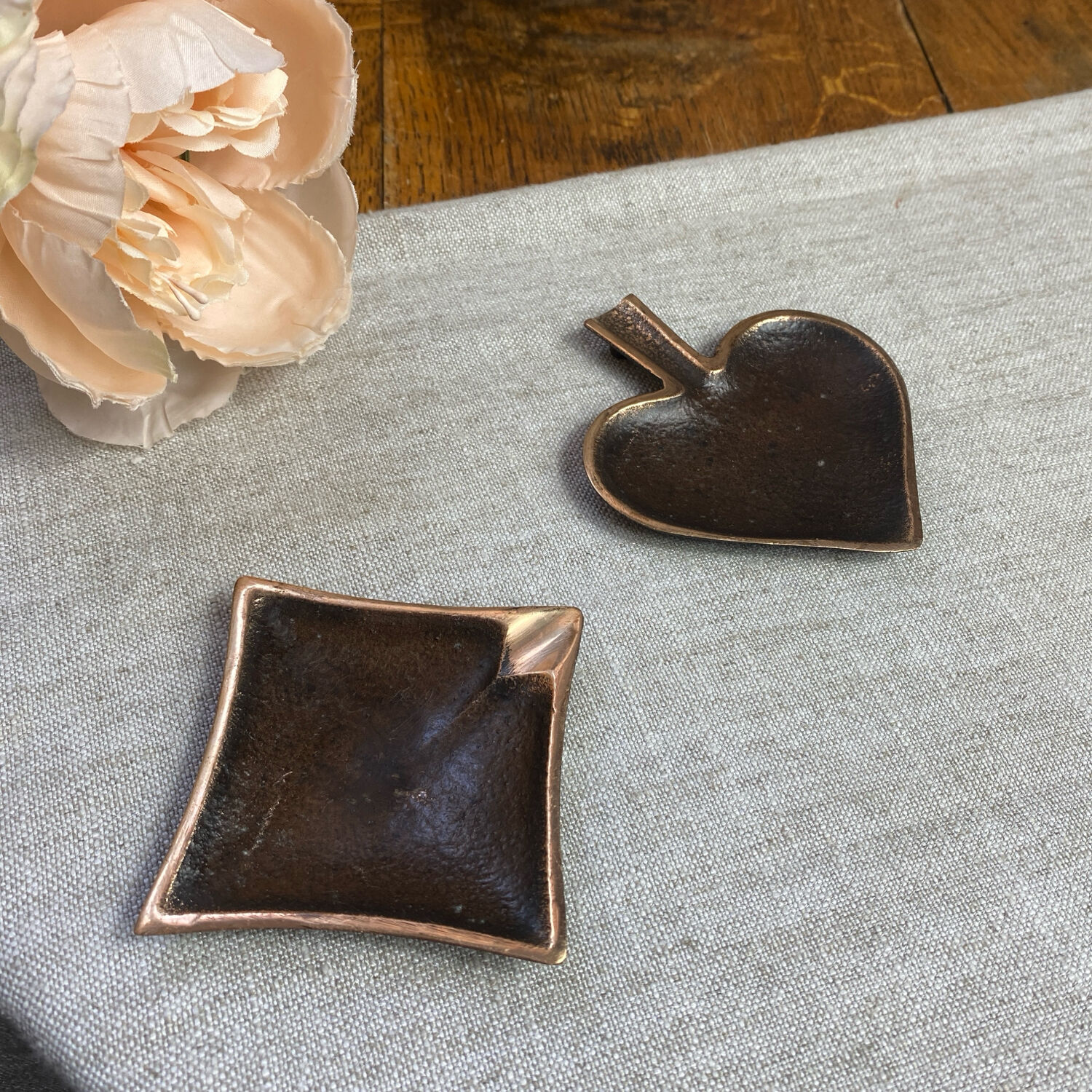 Bronze spade and diamond ashtrays