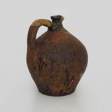 Old goat, jug, gargoulette, water pitcher in glazed green sandstone. nineteenth century