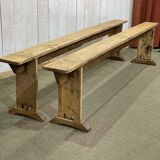 Pair of farmhouse table benches in poplar from the early 20th century.