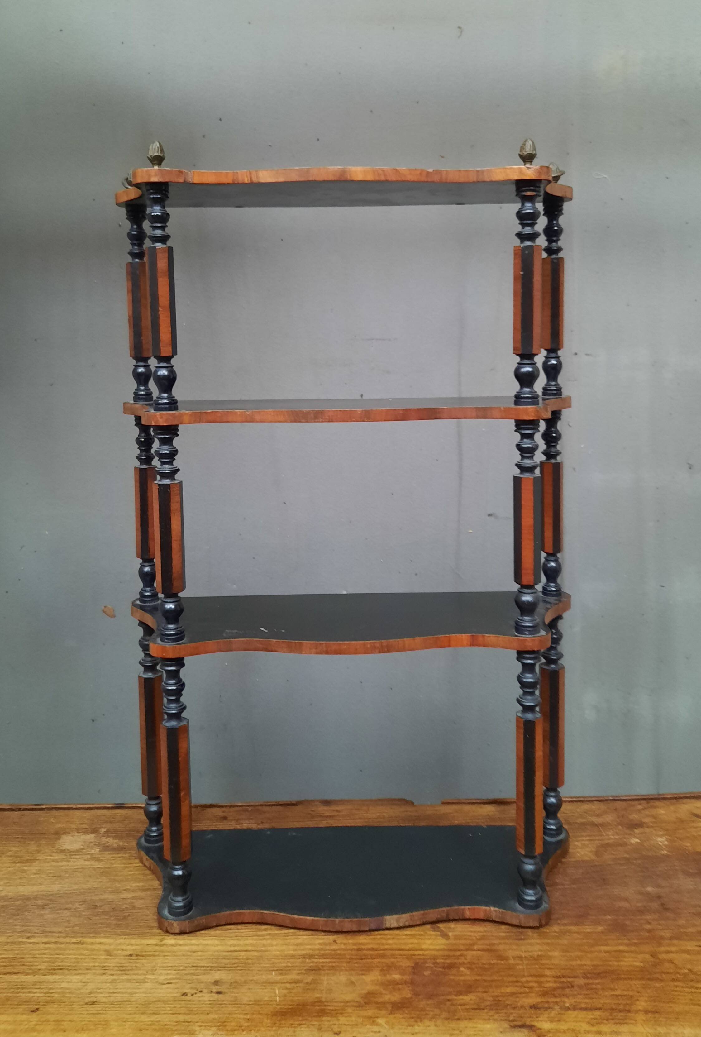 Blackened wooden wall shelf