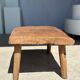 Coffee table in blond teak quadripod