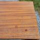 60s desk in golden blond mahogany with conical coffered feet
