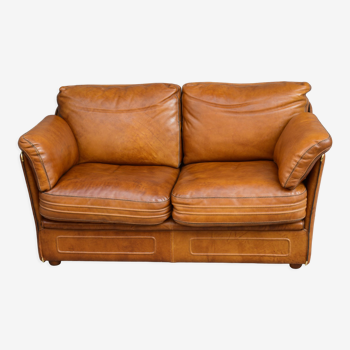 Vintage two-seater leather sofa