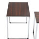 Vintage nesting table in rosewood and high polished metal base.