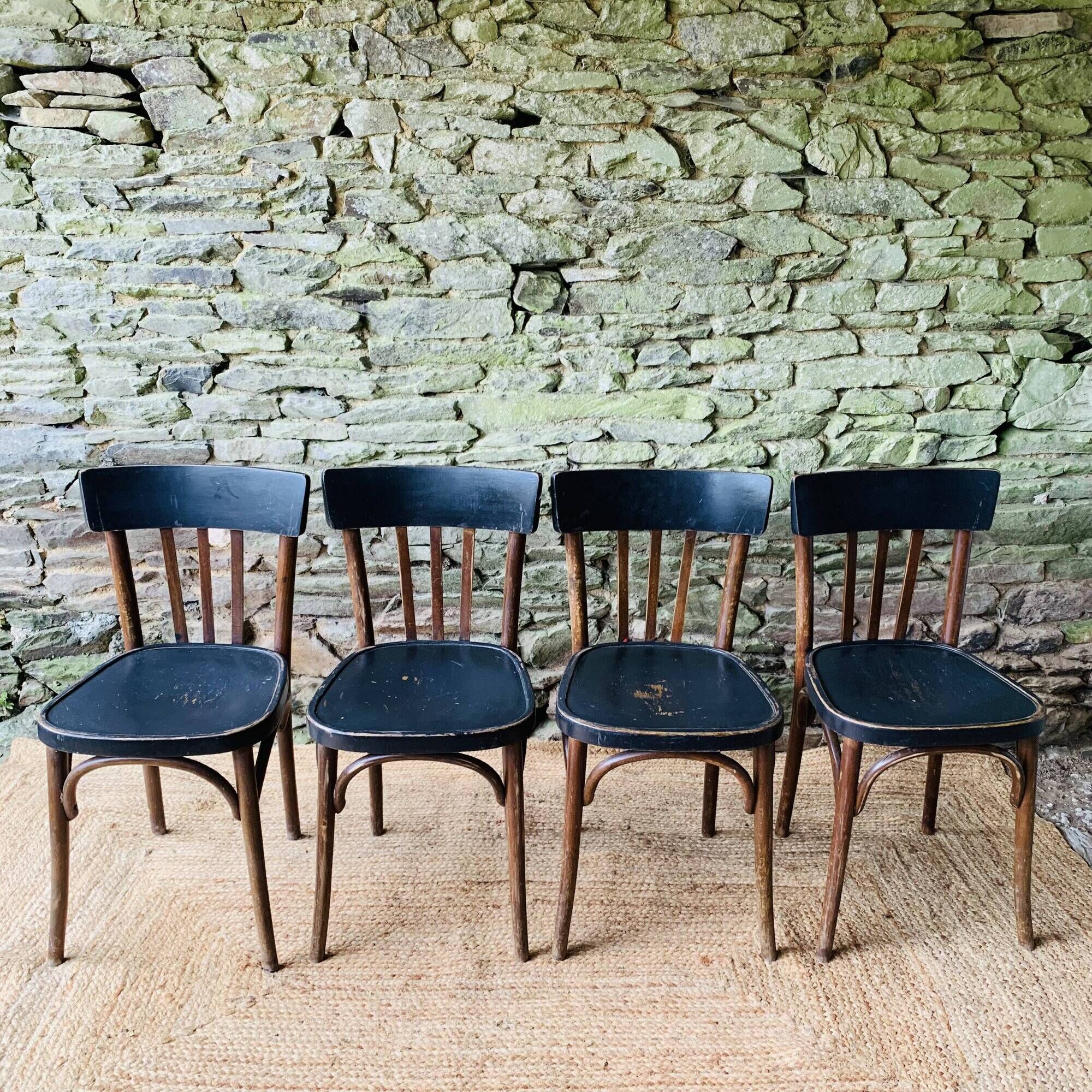 Set of four vintage bentwood bistro chairs.