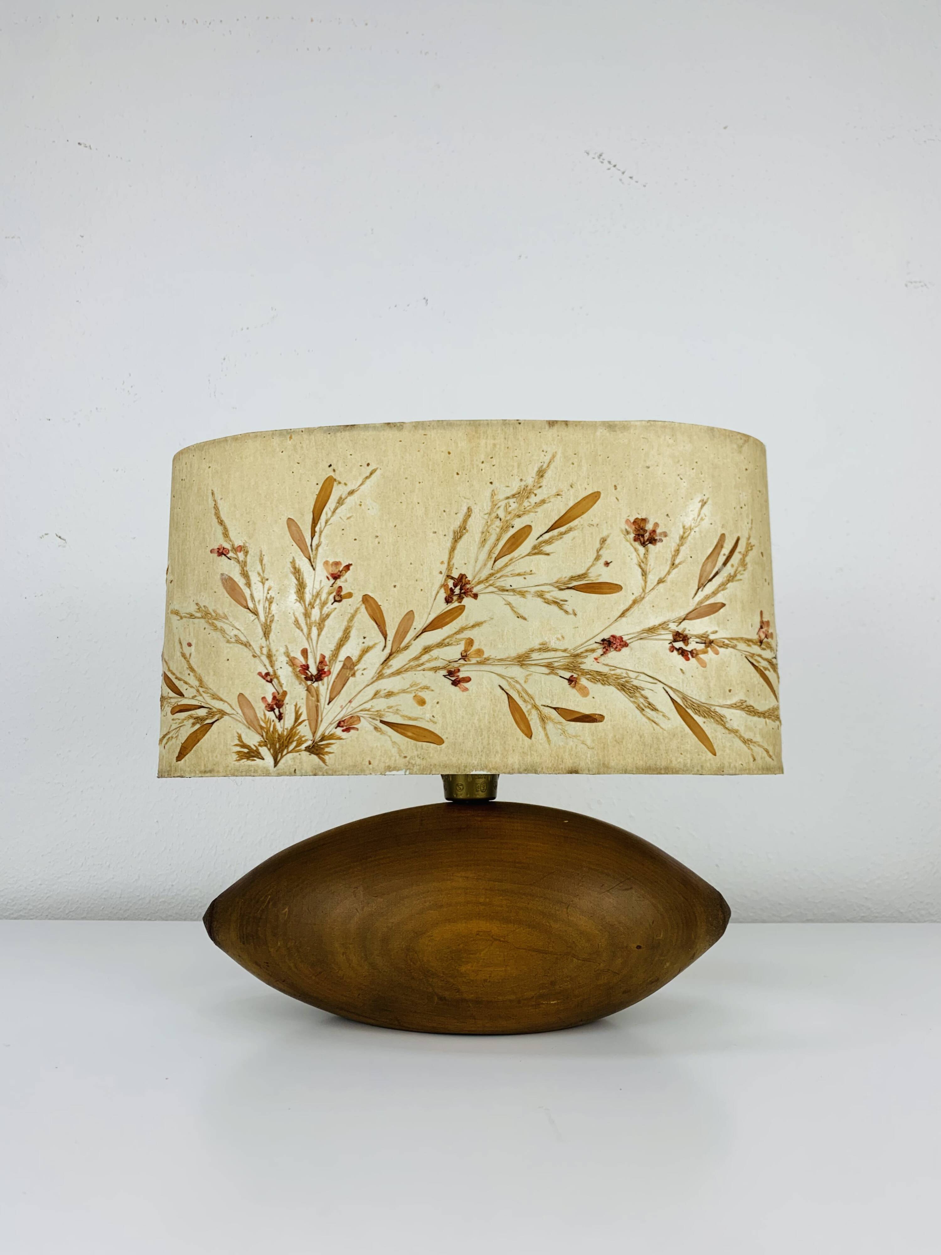 Vintage wooden lamp with dried flower shade