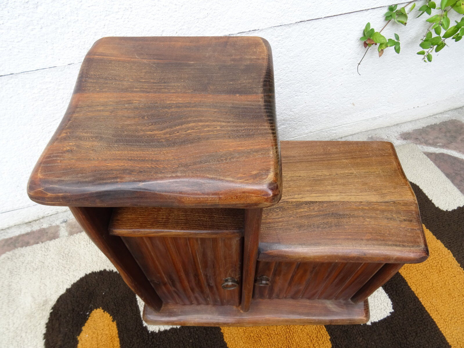 Asymmetrical brutalist furniture in solid elm