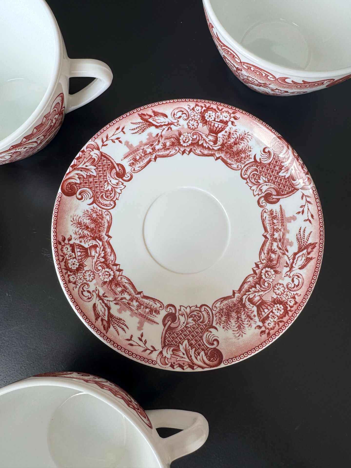 5 cups and 5 saucers Rivanel in red opaline from the 1970s.