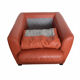 Roche Bobois armchair in mandarin colour.