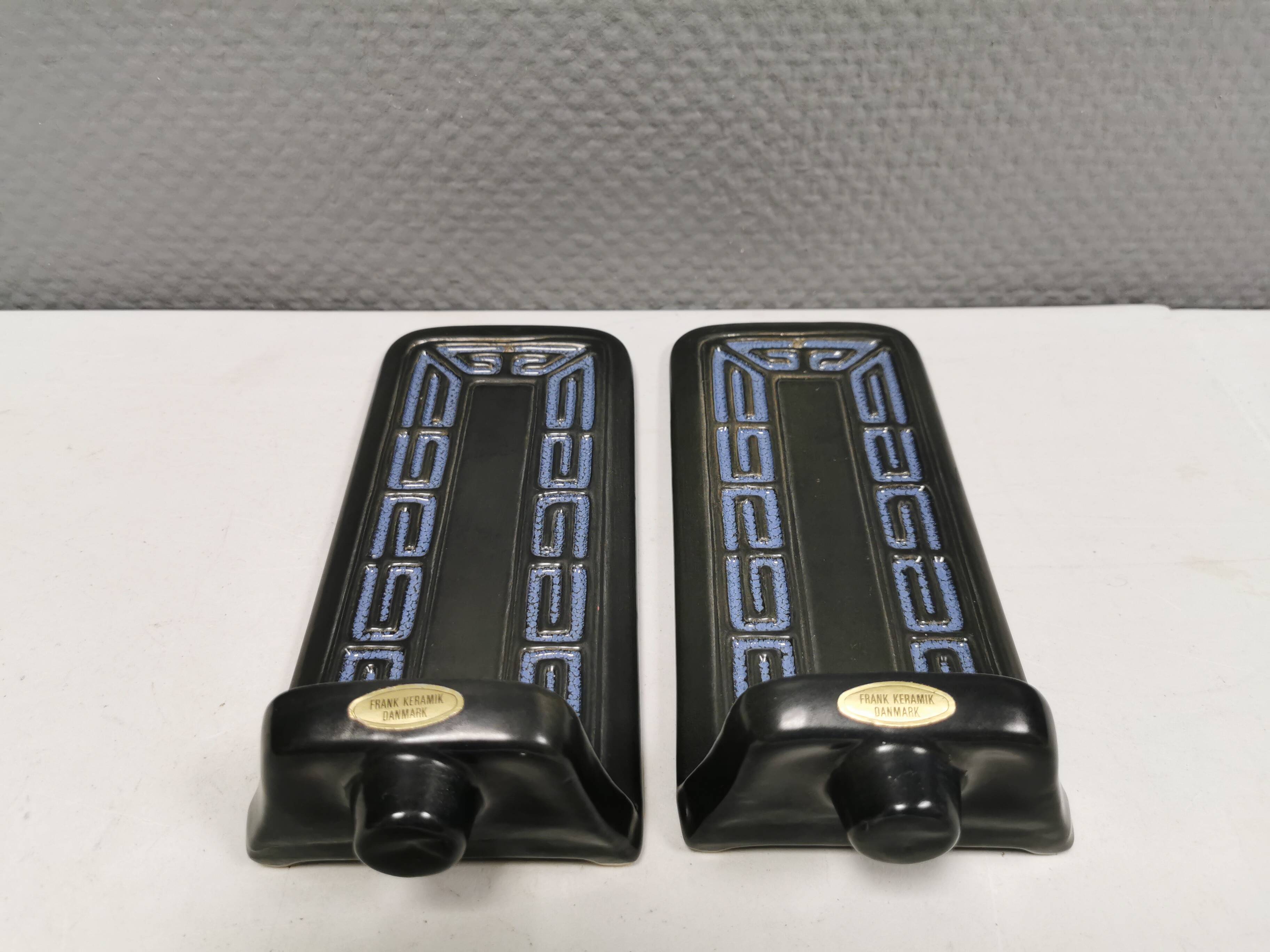 Two wall-mounted candlesticks by Danish Frank Ceramics 1970s.