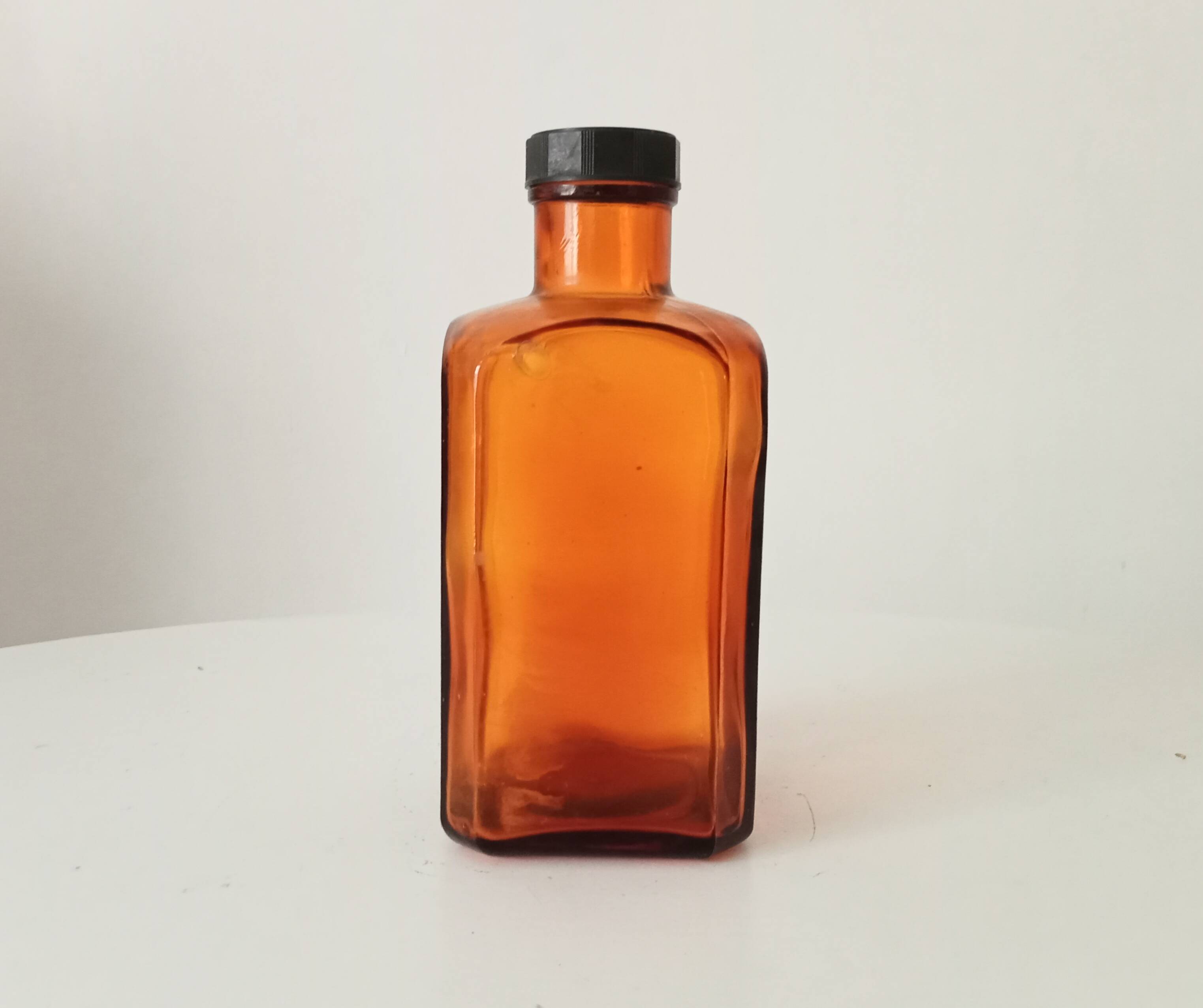 Old amber pharmacy bottle