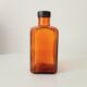 Old amber pharmacy bottle