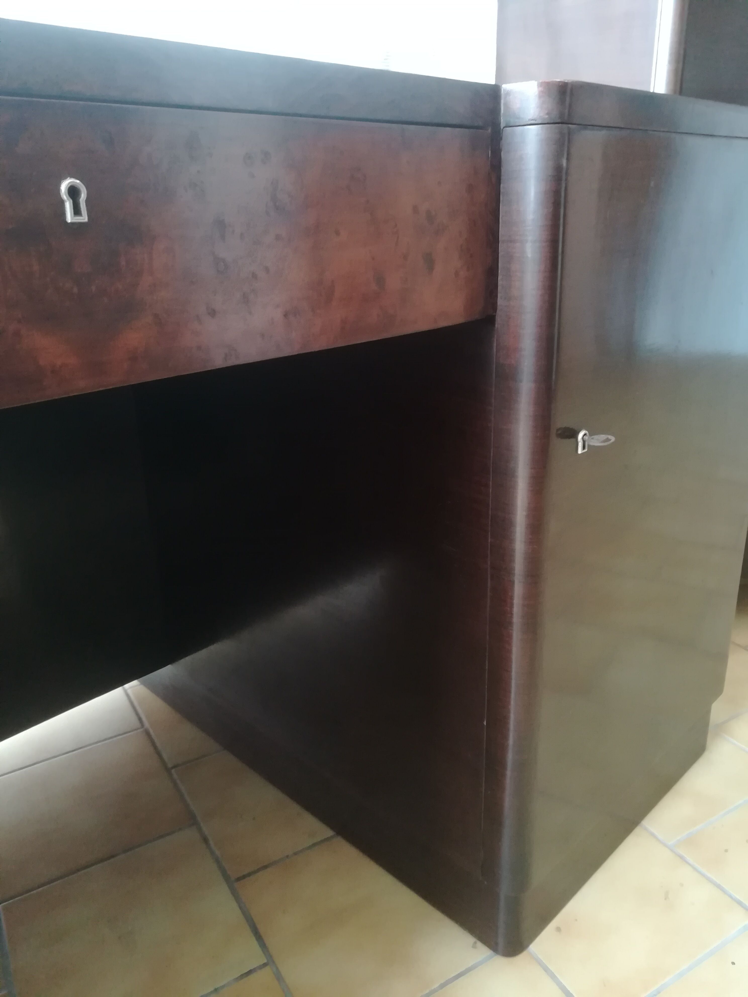 Art deco desk in rosewood and magnifying glass