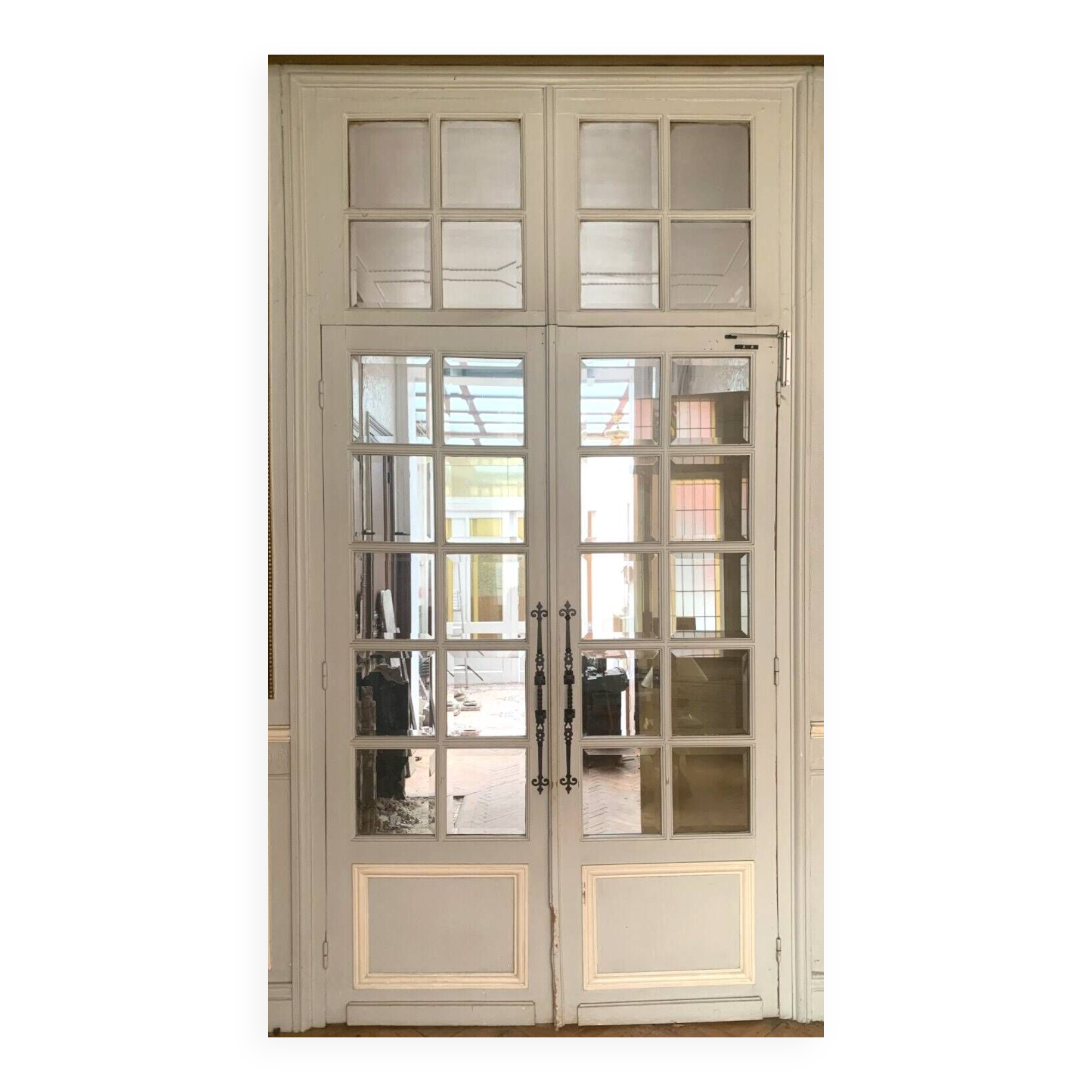 Double separation doors with transom and beveled glass 20th century