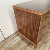 1950s chest of drawers covered in walnut with brass handles