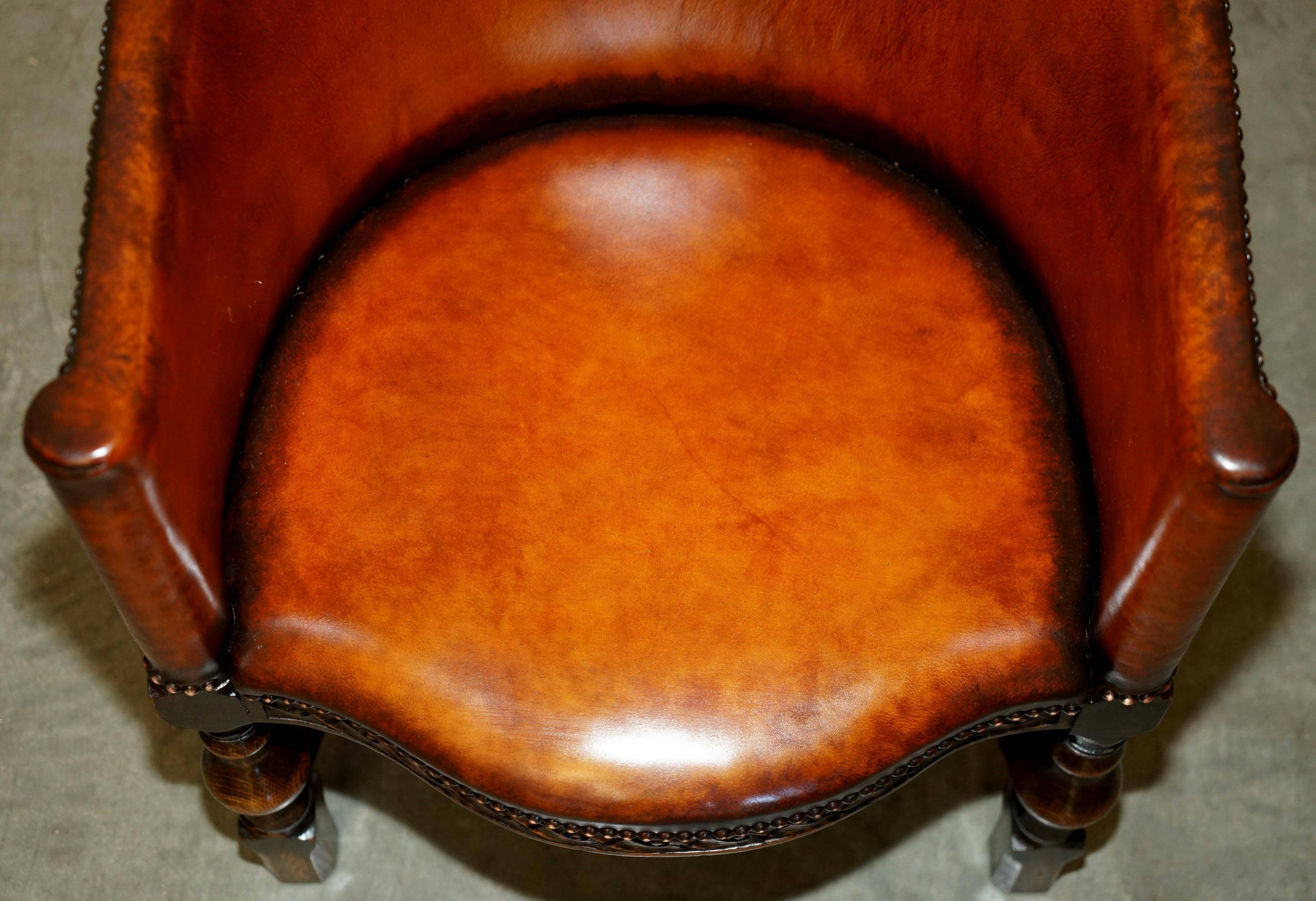 Fauteuil de bureau Édouardien 1910 en cuir et chêne sculpté
