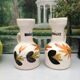 Old vinegar and oil maker with vintage decoration floral motifs