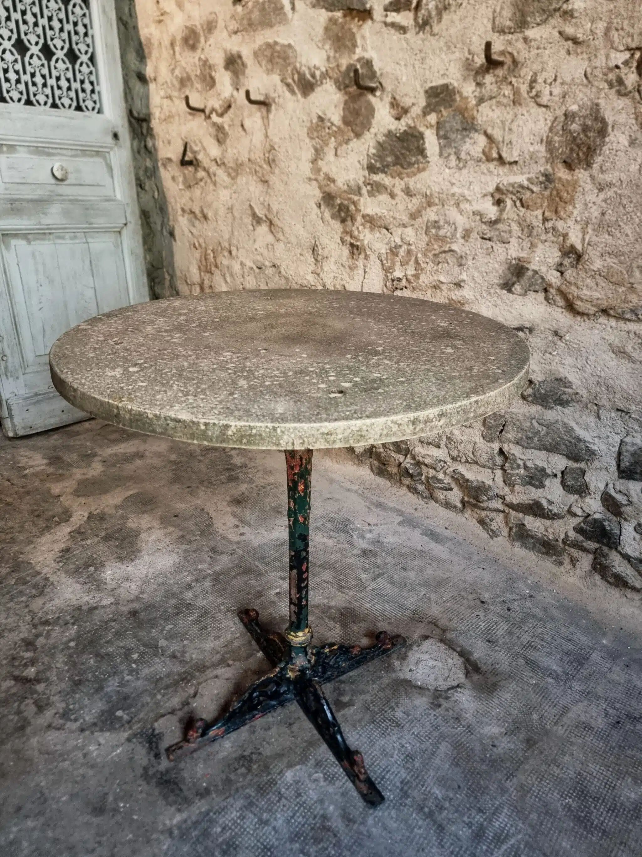 Bistro table / old garden with a cast iron base and stone top, France