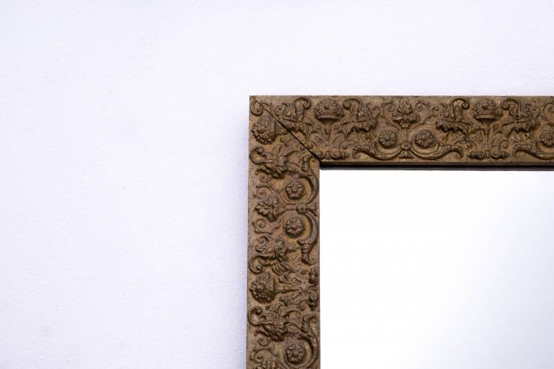 Old mirror in a gold frame.