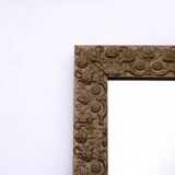 Old mirror in a gold frame.