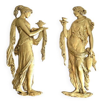 Pair of gilded bronze bas-reliefs of women