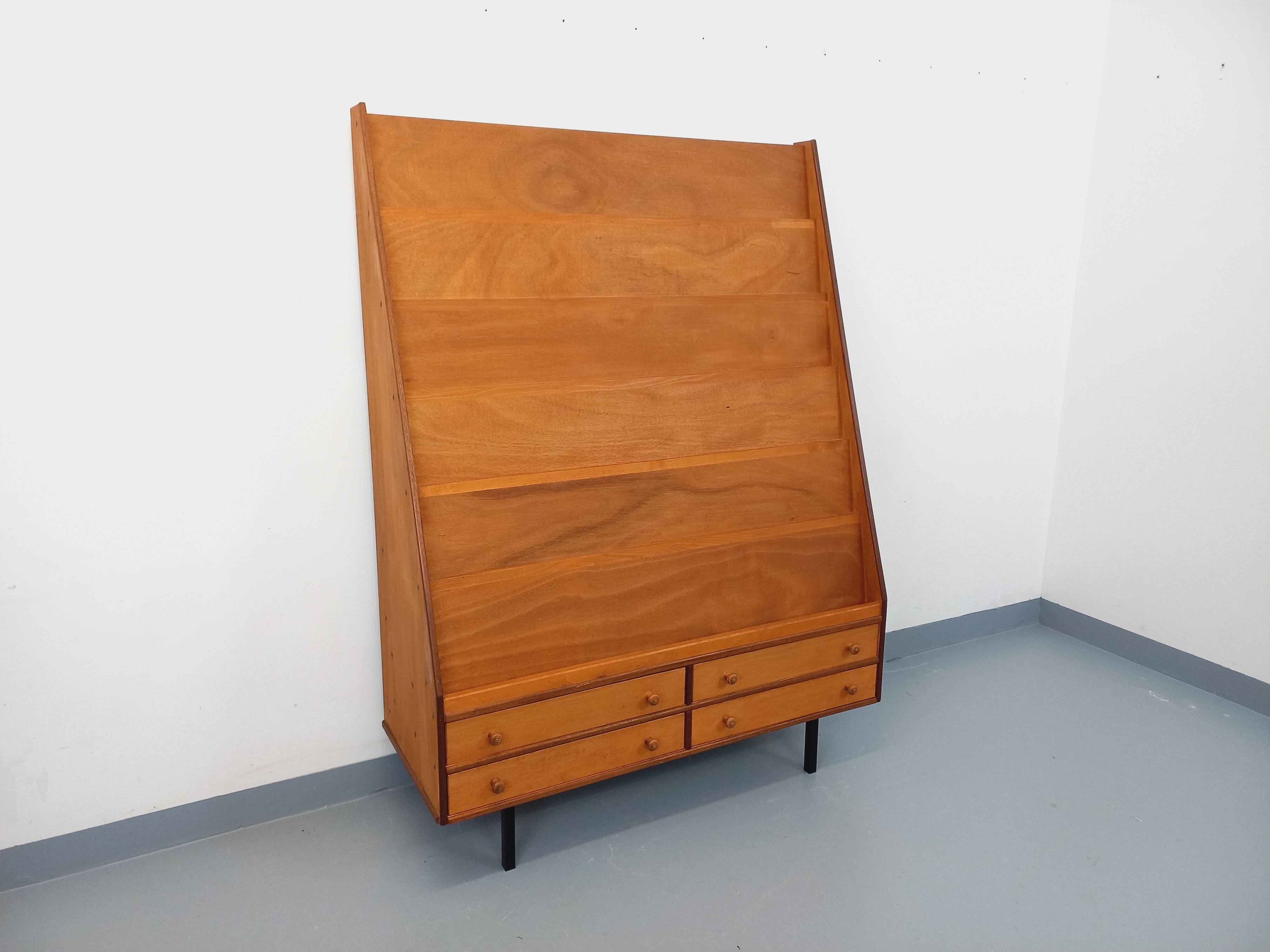 Vintage wooden display bookshelf with drawers from the 1960s.