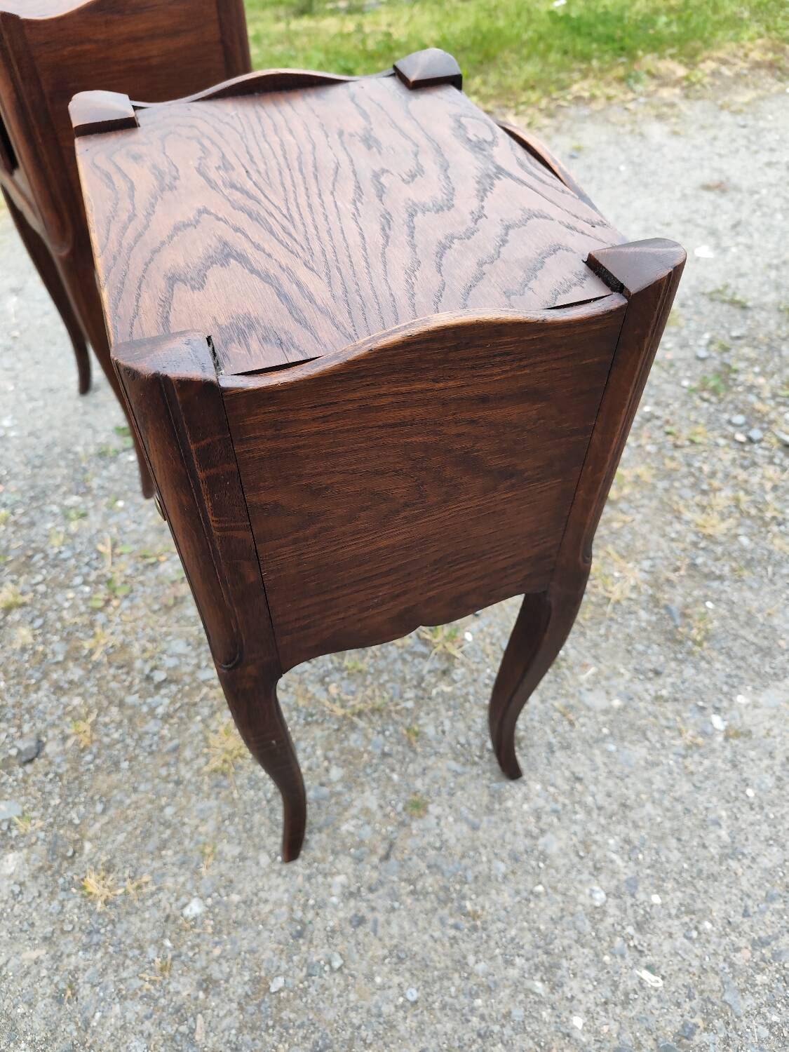 Pair of oak bedside tables with curtained niche doors