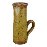 Sandstone pitcher signed "Guy Baudat"
