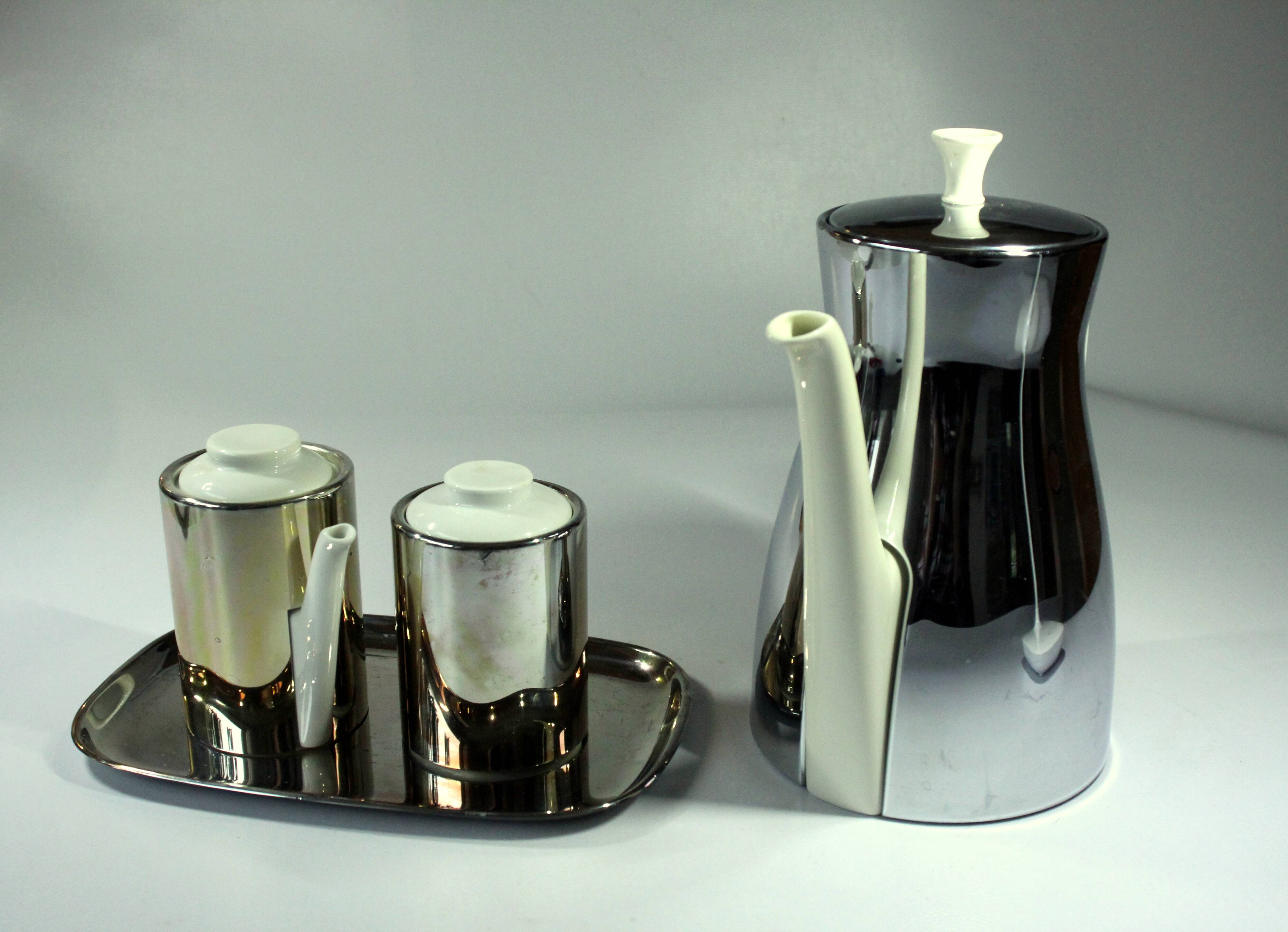 Coffee pot with metal isolated warming hood as a set with milk jug and sugar bowl, Vintage