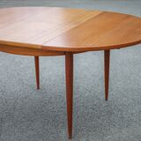 Scandinavian design wooden table, dining room table with integrated extension
