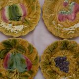 Set of 4 Sarreguemines majolica plates. Fruit decoration.