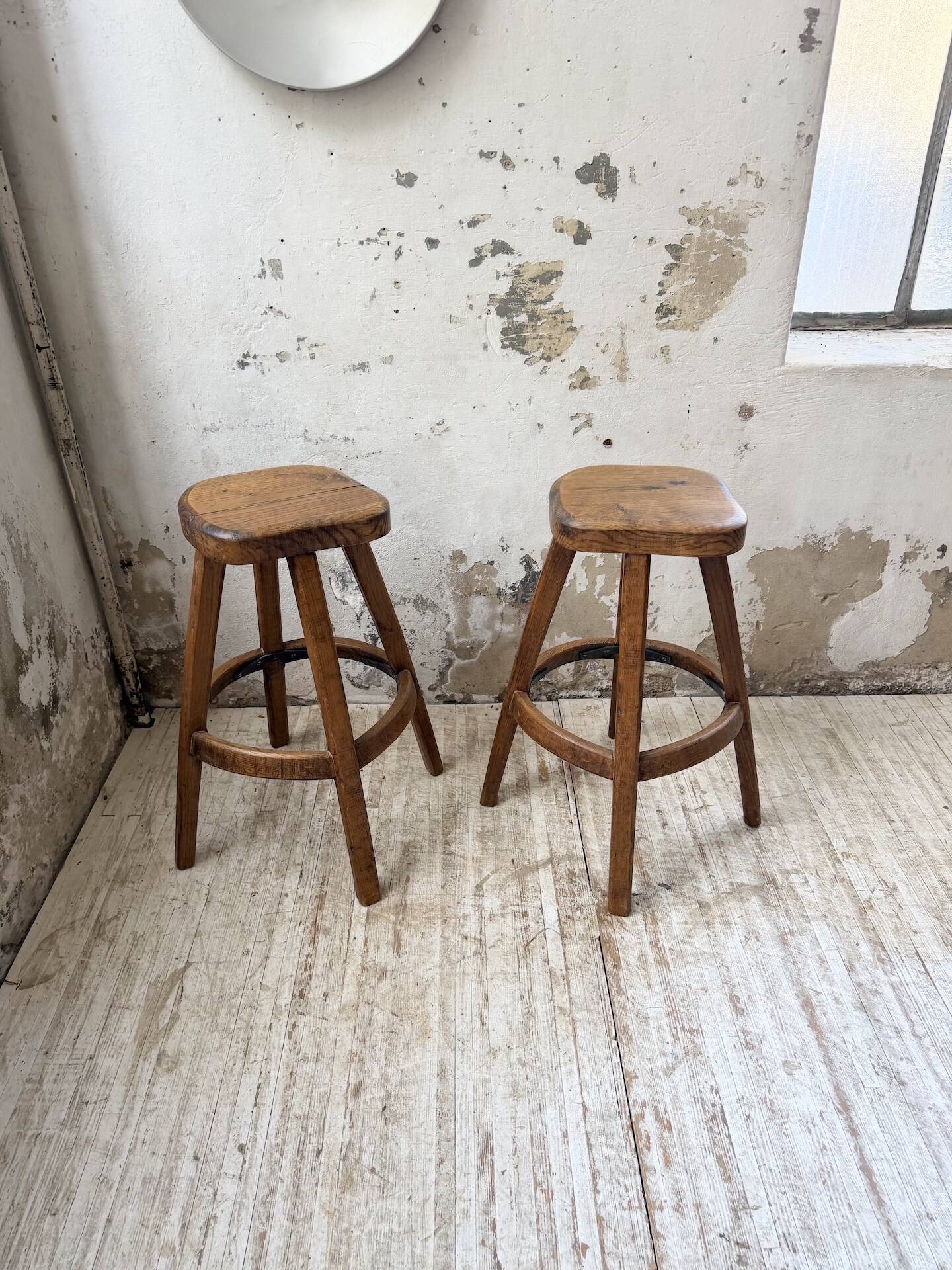 Pair of Henri Bataille stools in oak