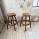 Pair of Henri Bataille stools in oak