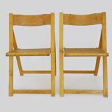 Pair of vintage folding chairs in beech and canework. Italy 70s