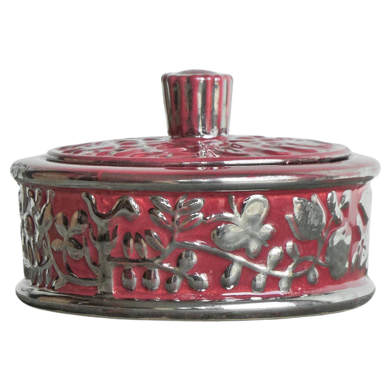Boch Frères Keramis Rosa bowl with lid, flowers and butterflies in silver glaze.