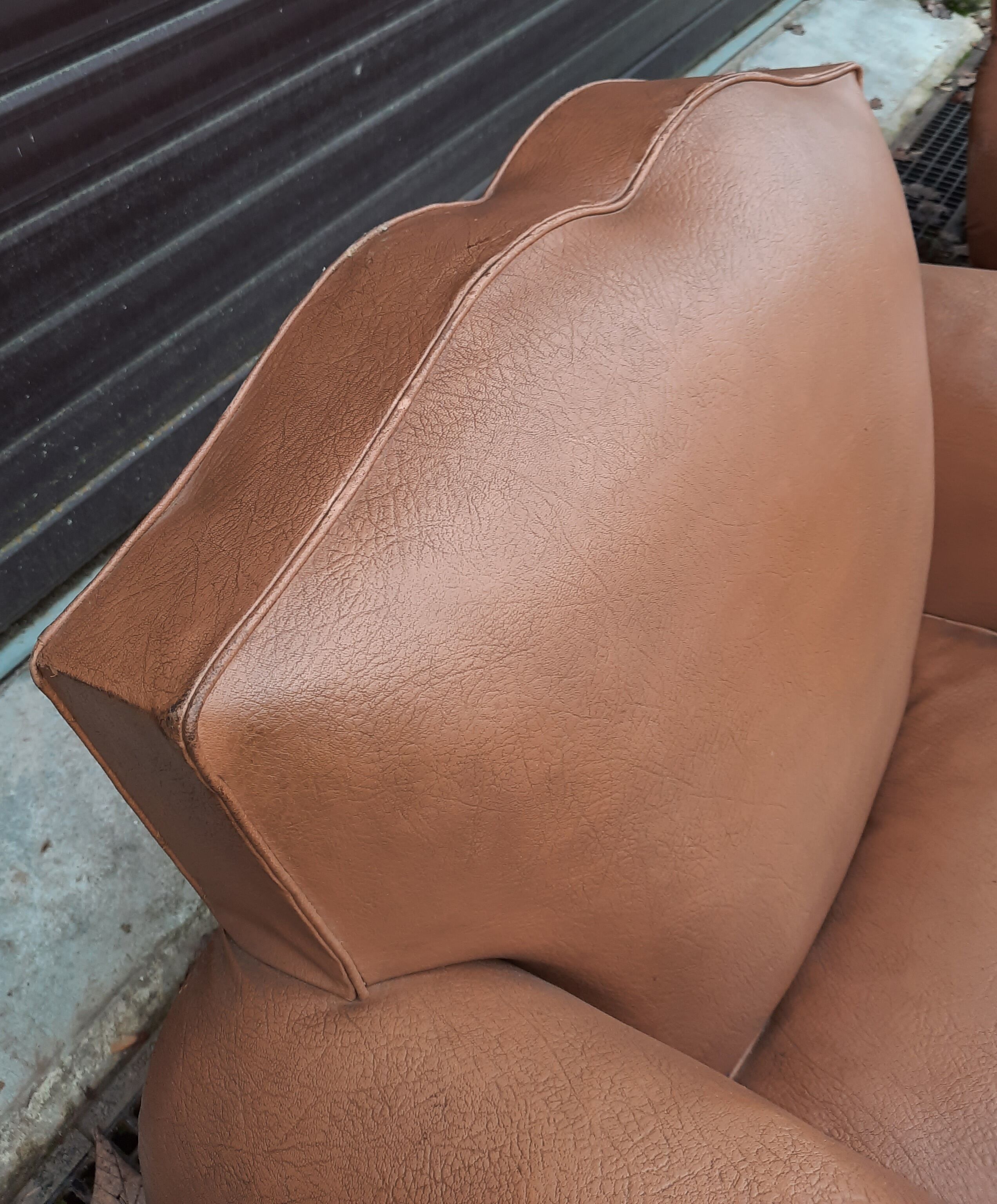 Pair of club chairs in skai
