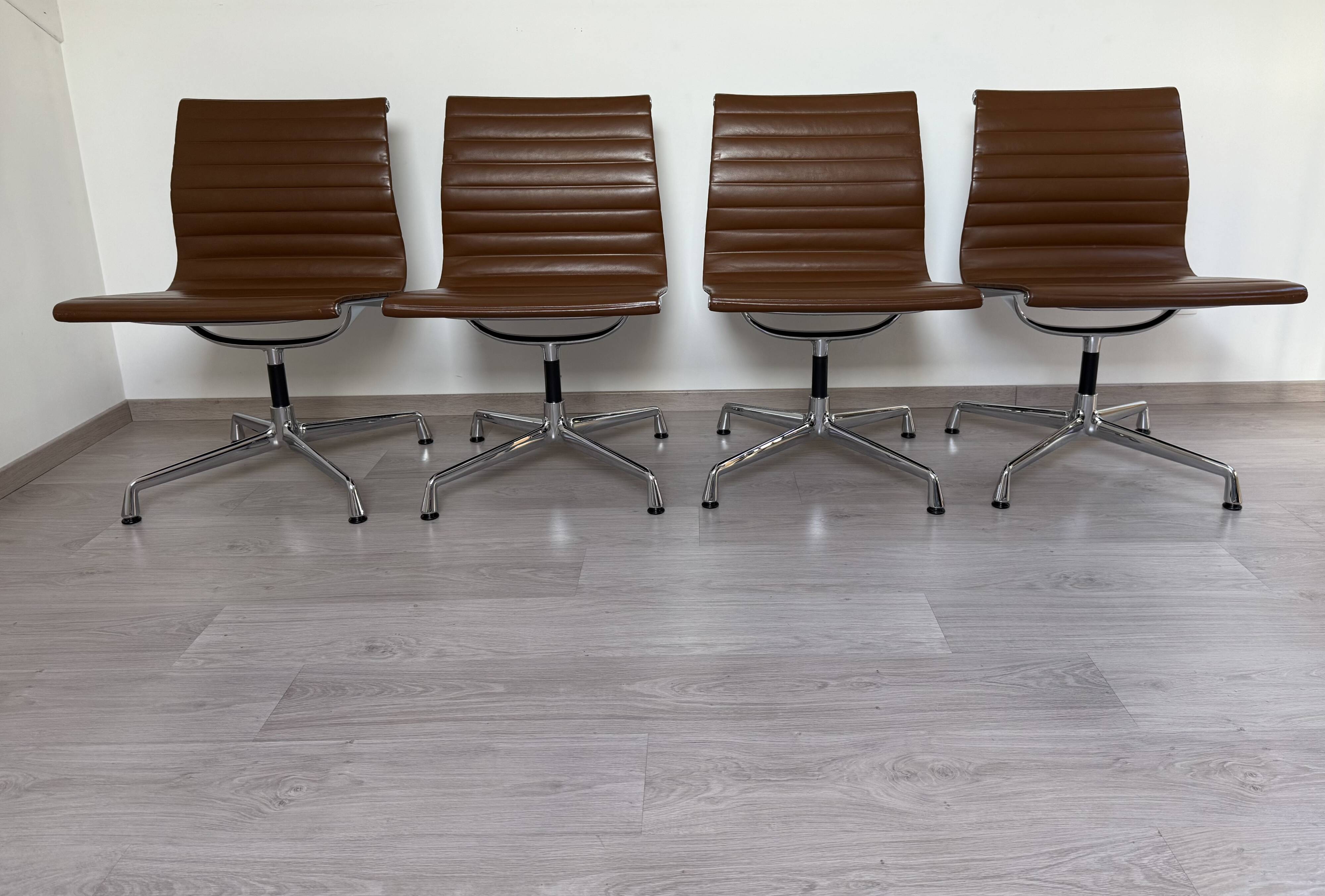 Set of 4 Eames EA105 Vitra armchairs from 2007