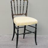 Napoleon III chair late 19th in blackened wood with gilded patterns