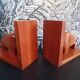 Pair of teak bookends in the shape of a bison