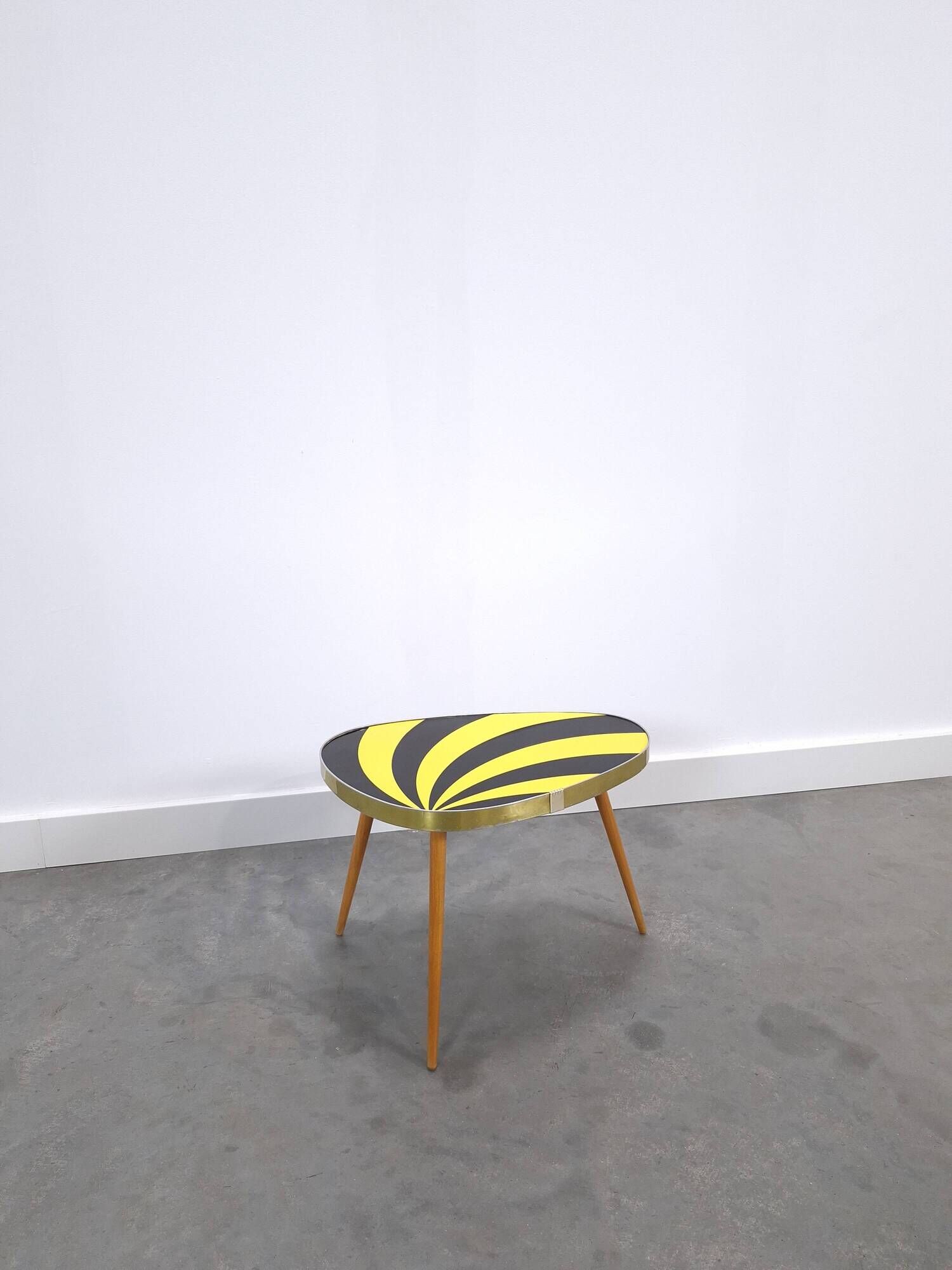 Vintage 1950s black and yellow striped formica table, plant table.