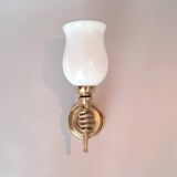 Golden brass wall light from the 1950s.