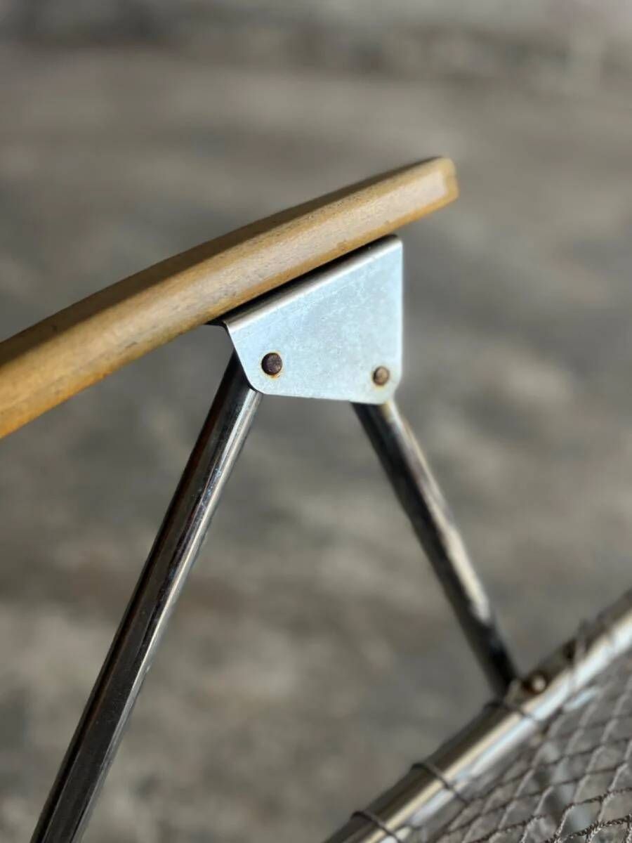 Set of two vintage folding chairs with an aluminium wire frame.