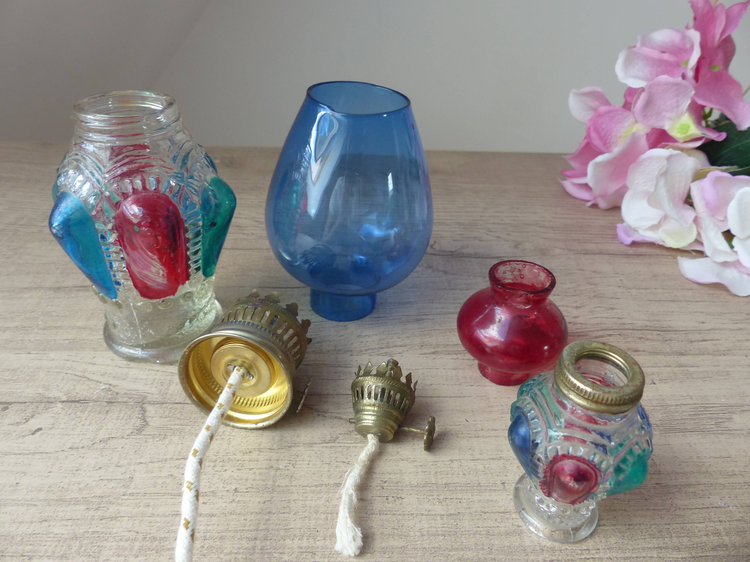 Set of two old hong kong colored glass oil lamps