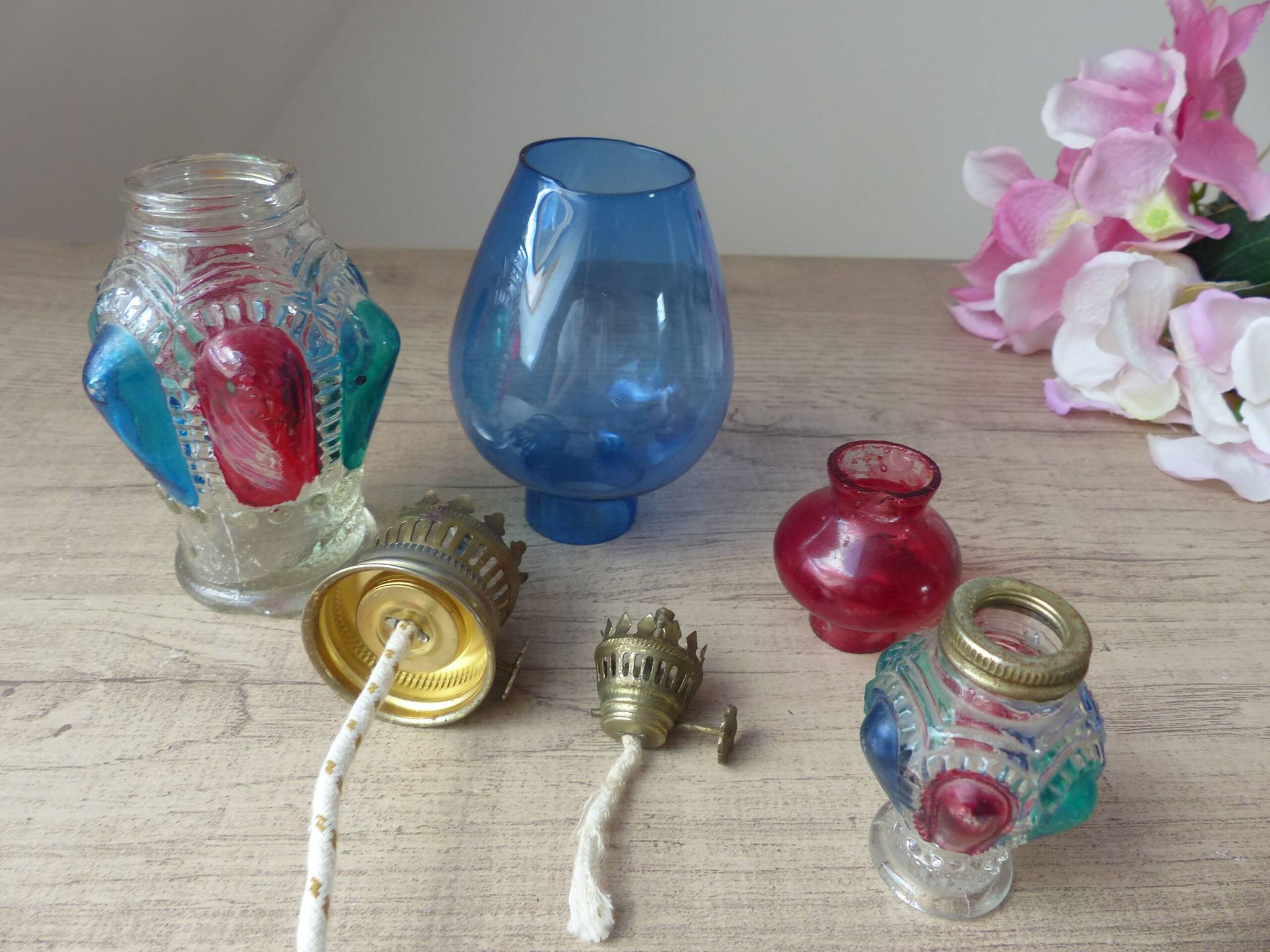 Set of two old coloured glass oil lamps Hong Kong.